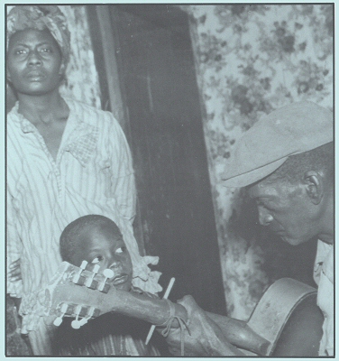 ' S L E E P Y' &nbsp; J O H N &nbsp; E S T E S with wife and kid; source: Charly Sun Box 105 booklet