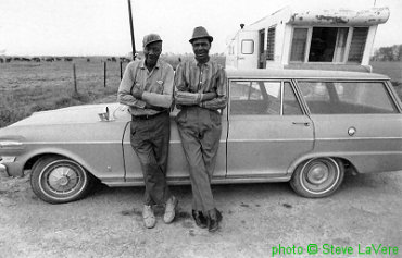 Fiddlin' Joe Martin and W O O D R O W   A D A M S, Robinsonville, Mississippi, April 18, 1971; source: Postcard from a postcard book by Stephen C. LaVere (Pomegranate Artbooks 1989, revised 1993); photographer: Stephen LaVere