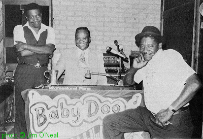 George 'Mojo' Buford, 'Baby Doo' Caston & Jo Jo Williams, McGuire's, St. Paul; source: Living Blues #43 (Summer 1979), p. 6; photographer: Jim O'Neal