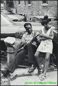 Johnny Embry on Maxwell Street; source: Valerie Wilmer: The Face of Black Music.- New York (Da Capo Press) 2nd paperback printing 1983, no pagination; click to enlarge!