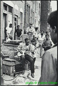 Johnny Embry on Maxwell Street; source: Valerie Wilmer: The Face of Black Music.- New York (Da Capo Press) 2nd paperback printing 1983, no pagination; click to enlarge!