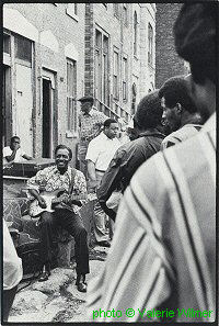 Johnny Embry on Maxwell Street; source: Valerie Wilmer: The Face of Black Music.- New York (Da Capo Press) 2nd paperback printing 1983, no pagination; click to enlarge!