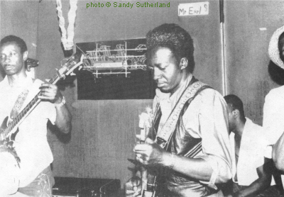 Baby Duck Embry [John Embry's brother], Johnny Embry, Ted Harvey & Jimmy Reeves Jr. at Florence's Lounge, 54th & Shields, Chicago, IL, early 1970s; source: Blues Unlimited 106 (February/March 1974), p. 21; photographer: Sandy Sutherland; click to enlarge!