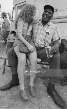 Howling Wolf with fan (Monica McCabe) at Ann Arbor Blues Festival, 1970; source: getty images; photographer: Tom Copi