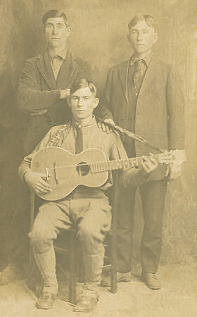 P R I N C E   A L B E R T   H U N T (with guitar), back left, his brother, John Wesley Hunt, on the right, brother, Corbin Lee Hunt