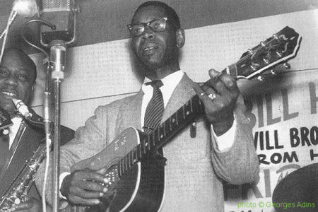 Big Bill Hill (disc jockey), Homesick James, g; J.T. Brown, ts; Elmore James, voc, g; Cassel Burrows, dr at Thelma's Lounge, Chicago, 1959; photographer: Georges Adins; click to enlarge!