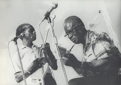A R T H U R   'Guitar'   K E L L Y & Silas Hogan at the 1972 New Orleans Jazz & Blues Festival; source: 'Michael P. Smith, p. 36; photographer: Michael P. Smith
