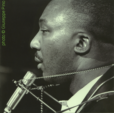 J.B. Lenoir during the 'Alabama Blues' tour (subsequent to the American Folk Blues Festival '66, featuring Lenoir, Wells, Little Brother Montgomery, Jack Myers & Fred Below), late October or November 1966, Lenoir with a Gagliano Model K-150 archtop guitar (made by Höfner/Germany); source: Giuseppe Pino: Black & Blues.- Hamburg, Germany (earBOOKS, a division of edel CLASSICS GmbH) 2005, no pagination; photographer: Giuseppe Pinoclick to enlarge!