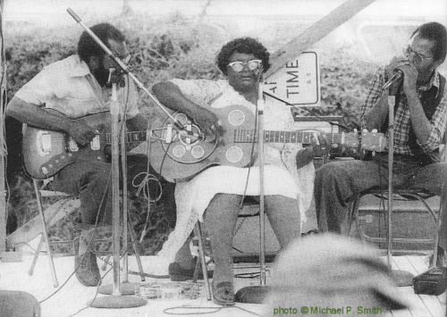 The Flora Molton Group (Tim Lewis, Flora Molton, Larry Wise) at the 1978 New Orleans Jazz & Heritage Festival; source: Michael P. Smith: New Orleans Jazz Fest, A Pictoral History.- Gretna 1991, p. 98; photographer: Michael P. Smith