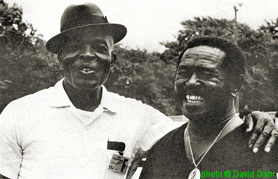 B U D D Y   M O S S with Brownie McGhee; source: Brownie McGhee & Happy Traum: Brownie McGhee Blues Guitar.- New York (Oak Publications) 1971, p. 93; photographer: David Gahr; click to enlarge!