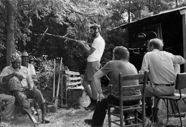 l-r: P E G   L E G   S A M, unknown (might be Bill Jackson, Peg's older brother), Kip Lornell (with boom mic), Bruce Bastin, and Tom Davenport (with camera), 1976; source: University of North Carolina at Chapel Hill Image Collection (P0004), North Carolina Collection Photographic Archives @ https://blogs.lib.unc.edu/sfc/tag/peg-leg-sam/