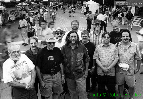 At the 2002 Chicago Blues Festival; (Front row, left to right): Bob Koester, Dick Shurman, Jim O'Neal, Larry Hoffman, Scott Barretta; (Back rows, from left): Steve Tomashefsky, Justin O'Brien, Dawayne Gilley, Amy van Singel, Robert Pruter, Chris Strachwitz; photographer: Robert Barclay (Courtesy of Jim O'Neal)