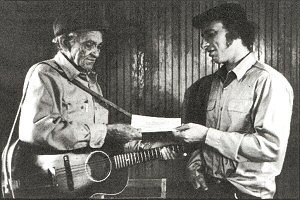 Nick Perls presenting a cheque to Sam Chatmon; source: Juke Blues No. 10 (Autumn 1987), p. 3, Editorial announcing Nick Perls's death on 22 July 1987 (
