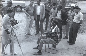 Dietrich Wawzyn and his wife, Anna Marie, filming in the Third Ward, Houston, Texas, 1963; source: Alan Govenar: Lightnin' Hopkins - His Life and Blues.- Chicago (Chicago Review Press) 2010, unpaginated photo pages between pp. 178 & 179; photographer: Chris Strachwitz; click to enlarge!