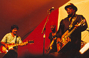 ... playing with Bo Diddley (1980s); photo courtesy Jerry Zolten; click to enlarge!