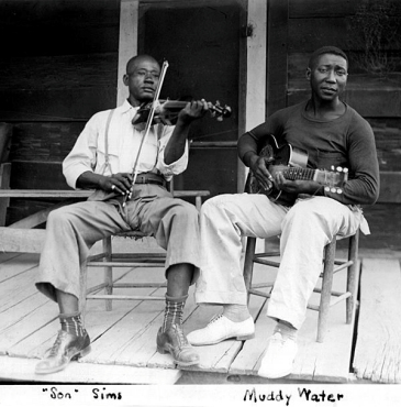 Henry 'Son' Sims and Muddy Waters in Clarksdale, MS, summer of 1942; photographer: John Wesley Work III, original photo housed at the 'Center for Popular Music' in Murfreesboro, Tennessee
