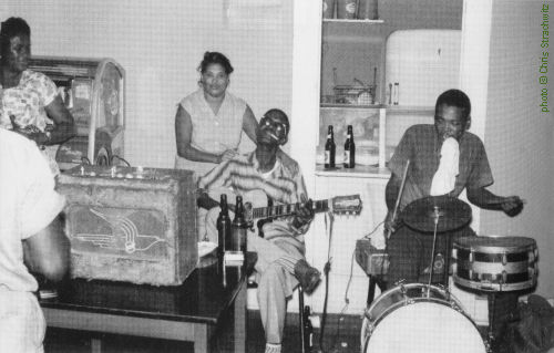 Lightnin' Hopkins & L.C.   'Lightnin' Jr.'   W I L L I A M S at the Sputnik Bar in Houston, TX, 1960; source: Alan Govenar: Lightnin' Hopkins - His Life and Blues.- Chicago (Chicago Review Press) 2010, unpaginated photo pages between pp. 178 & 179; photographer: Chris Strachwitz. The amp is a 1950s National Valco 1202 Sportsman Tweed, the guitar seems to be a Kay K-161 Thin Twin Jimmy Reed Model