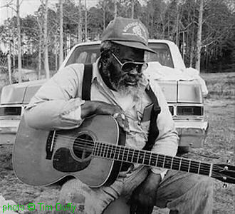 Jimmy Lee Williams 1980s/90s (?); source: Music Maker Relief Foundation; photographer: Tim Duffy; screen capture from youtube video at https://www.youtube.com/watch?v=sG5eo0FTZUI